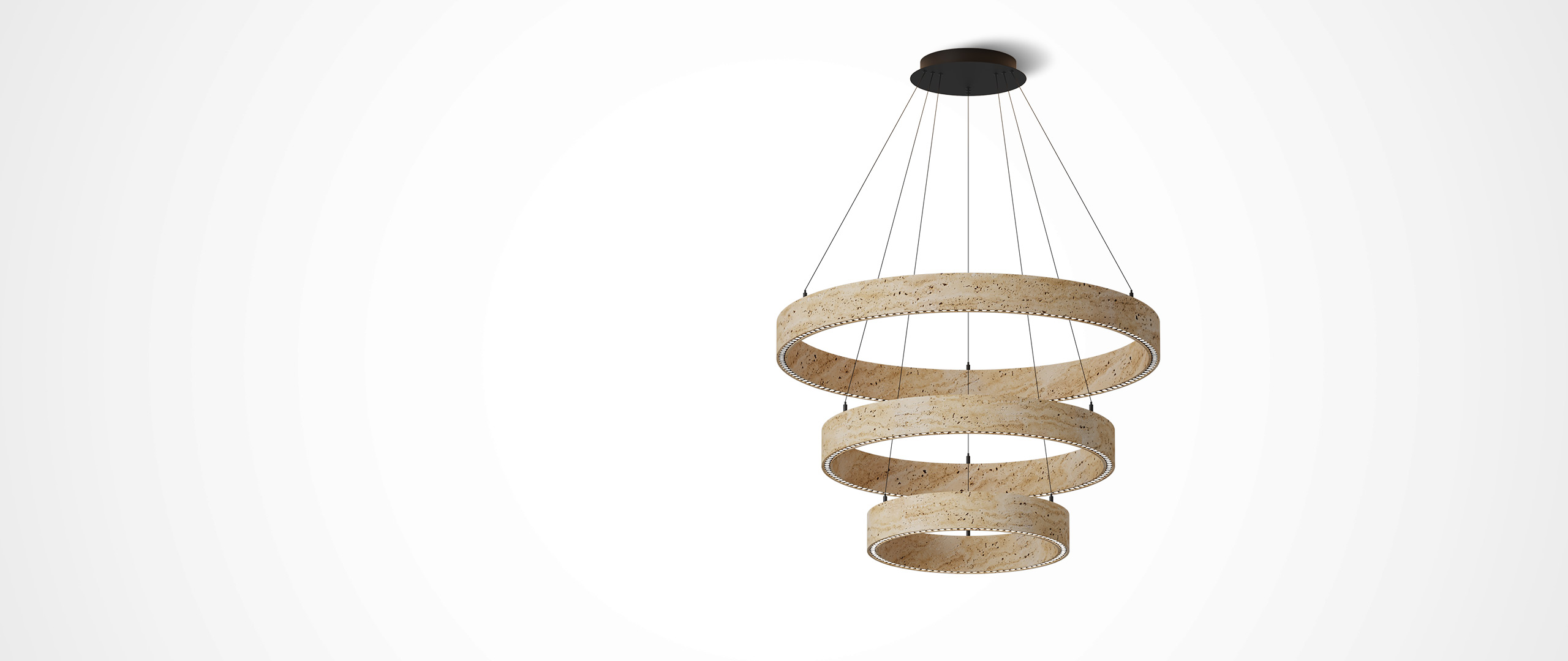 Travertine lighting poster: One stone suspends the light, half the room in rustic simplicity.