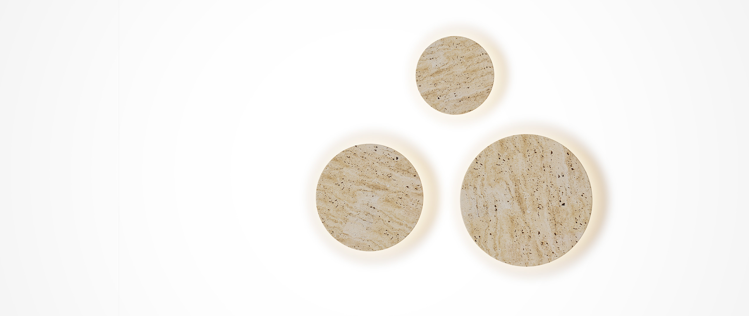 Travertine lighting poster: Porous stone rests against the wall, bringing warmth.